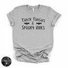Thick Thighs and Spooky Vibes Tee | Funny Halloween Graphic T-Shirt