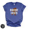 Bigfoot Exists Tee | Funny Cryptid Graphic T-Shirt (WHITE DESIGN)