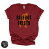 Bigfoot Exists Tee | Funny Cryptid Graphic T-Shirt (BLACK DESIGN)