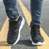Fly-woven safety shoes