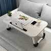 Notebook folding computer table