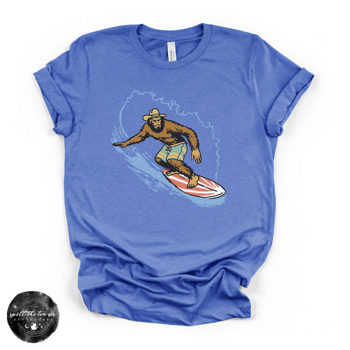 Surfing Bigfoot Tee | Funny Beach Sasquatch Graphic T-Shirt