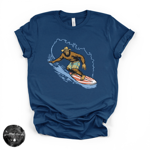 Surfing Bigfoot Tee | Funny Beach Sasquatch Graphic T-Shirt