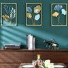 Modern Creative Living Room Sofa With Wrought Iron Wall Hanging On The Background