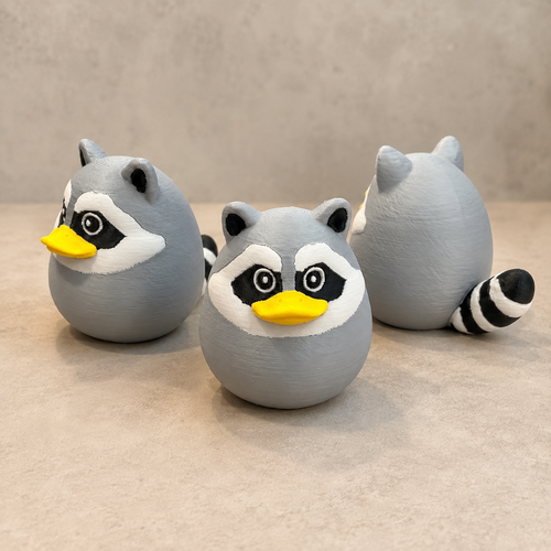 Kit n Kat Pal™ | Jimothy Raccoon Figurine - Duck Edition