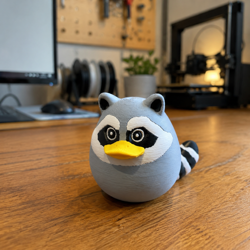 Kit n Kat Pal™ | Jimothy Raccoon Figurine - Duck Edition