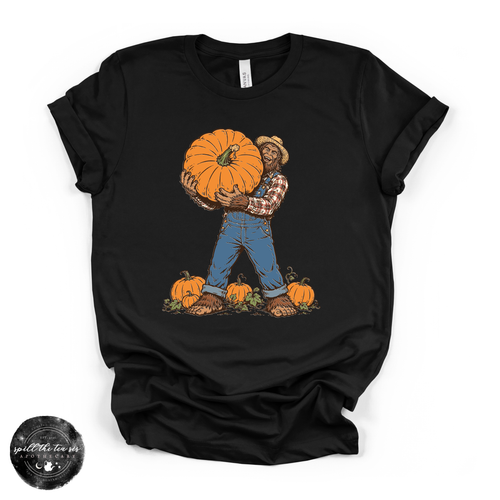 Bigfoot Carrying Pumpkin Tee | Funny Sasquatch Fall Graphic T-Shirt