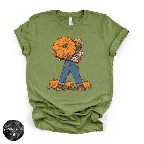 Bigfoot Carrying Pumpkin Tee | Funny Sasquatch Fall Graphic T-Shirt