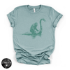 Bigfoot Riding Nessy Tee | Funny Cryptid Graphic T-Shirt