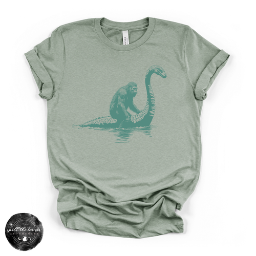 Bigfoot Riding Nessy Tee | Funny Cryptid Graphic T-Shirt
