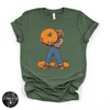 Bigfoot Carrying Pumpkin Tee | Funny Sasquatch Fall Graphic T-Shirt
