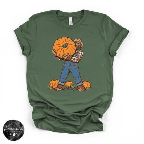 Bigfoot Carrying Pumpkin Tee | Funny Sasquatch Fall Graphic T-Shirt