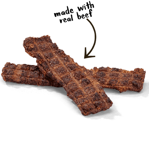 Cloud Star Wag More Bark Less Philly Cheesesteak Beef dog treats with natural beef and cheddar cheese, free from artificial ingredients.